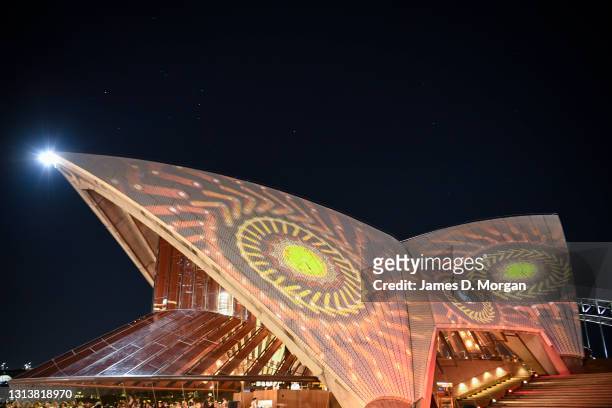 Projections of First Nations art illuminate the Opera House's eastern Bennelong sails at the Sydney Opera House on April 22, 2021 in Sydney,...