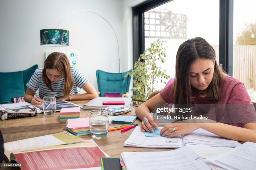 Two Make Homework Two Teenage Girls Doing Their Homework At A Table ストックフォト - Getty Images