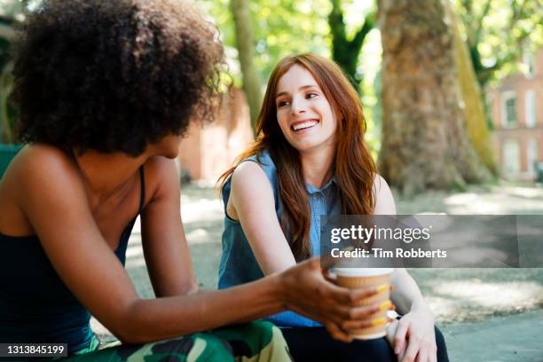 two women hanging out together - friends painting nails stock pictures, royalty-free photos & images
