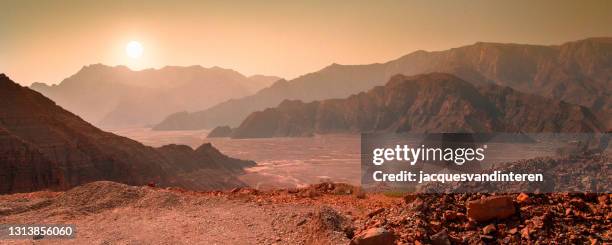 landscape on the panet mars with mountain range and sun - mars stock pictures, royalty-free photos & images