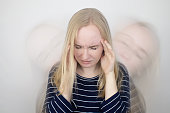 Woman loses consciousness and falls down due to dizziness and disturbance of the vestibular apparatus. Severe headache and migraine. Concept of helping people suffering from migraines and dizziness