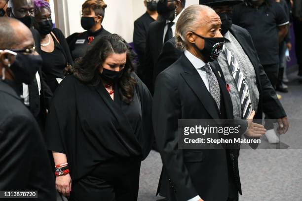 Rev. Al Sharpton walks with Wright's mother Katie Wright during a funeral held for Daunte Wright at Shiloh Temple International Ministries on April...