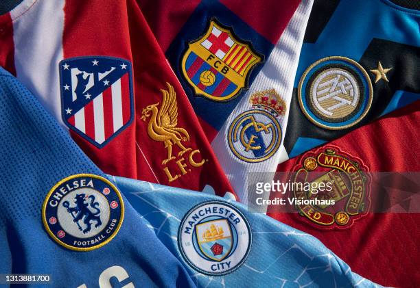 The club badges of some of the teams involved in the European Super League; Liverpool, Barcelona, Real Madrid, Inter Milan, Chelsea, Atletico Madrid,...