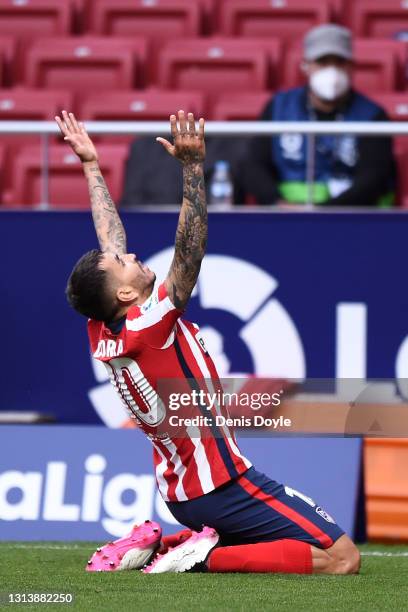 Angel Correa of Atletico de Madrid celebrates after scoring their sides first goal during the La Liga Santander match between Atletico de Madrid and...