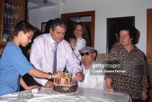 Spanish bullfighter Vicente Ruiz 'El Soro' on his birthday with his son Vicente and his parents, Foyos, Valencia, Spain, 2002.