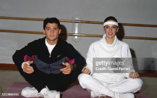 Spanish bullfighter Vicente Ruiz 'El Soro' with his wife Suzette in a gym, Foyos, Valencia, Spain, 1990.