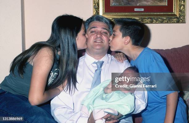 Spanish bullfighter Vicente Ruiz 'El Soro' on his birthday with his children Maria Suzette, Vicente and Marina, Foyos, Valencia, Spain, 2002.