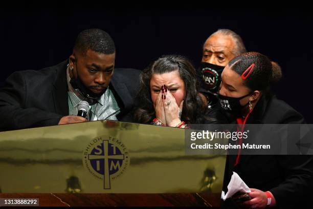 Father Arbuey Wright and mother Katie Wright give remarks alongside sister Diamond Wright and Rev Al Sharpton during a funeral held for Daunte Wright...