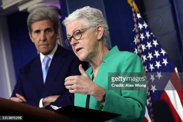 National Climate Adviser Gina McCarthy speaks as Special Presidential Envoy for Climate and former Secretary of State John Kerry listens during a...