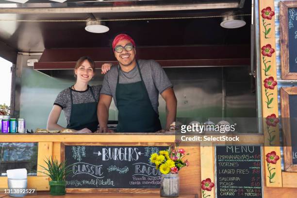 people working in food truck - small business stock pictures, royalty-free photos & images