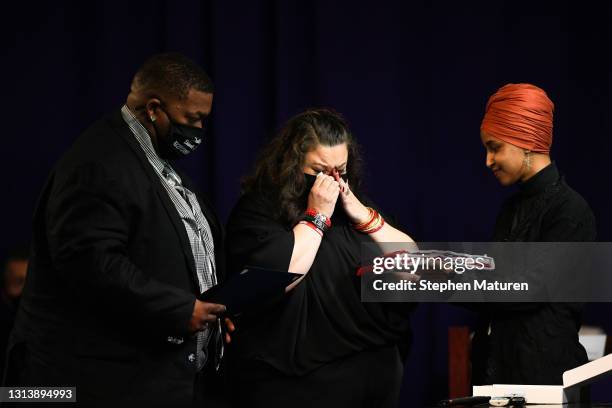 Father Arbuey Wright and mother Katie Wright are presented a flag by U.S. Rep Ilhan Omar during a funeral held for Daunte Wright at Shiloh Temple...