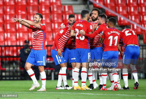 Roberto Soldado of Granada CF celebrates after scoring their sides first goal during the La Liga Santander match between Granada CF and SD Eibar at...