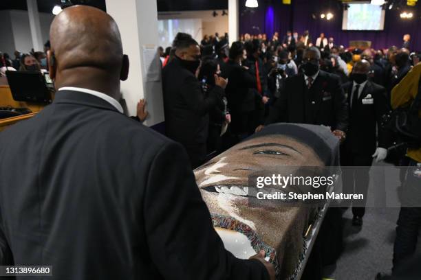 The casket is escorted out following a funeral held for Daunte Wright at Shiloh Temple International Ministries on April 22, 2021 in Minneapolis,...