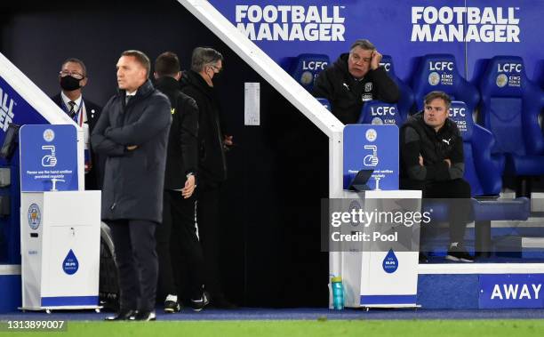 Sam Allardyce, Manager of West Bromwich Albion cuts a dejected figure as Brendan Rodgers, Manager of Leicester City looks on during the Premier...