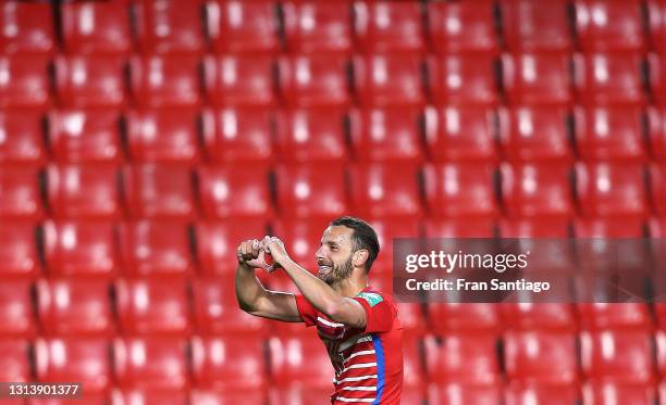 Roberto Soldado of Granada CF celebrates scoring a goal during the La Liga Santander match between Granada CF and SD Eibar at Estadio Nuevo Los...