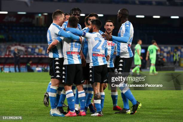 Dries Mertens of SSC Napoli celebrates after scoring their sides fourth goal with team mates during the Serie A match between SSC Napoli and SS Lazio...