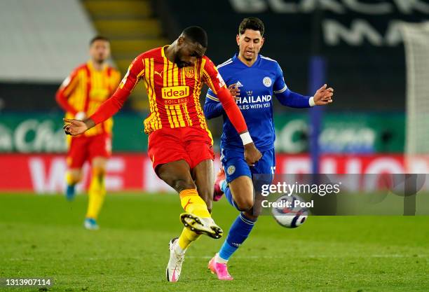 Semi Ajayi of West Bromwich Albion battles for possession with Ayoze Perez of Leicester City during the Premier League match between Leicester City...