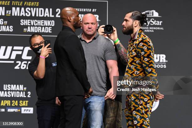 Welterweight Champion Kamaru Usman of Nigeria and Jorge Masvidal face off during the UFC 261 press conference at VyStar Veterans Memorial Arena on...