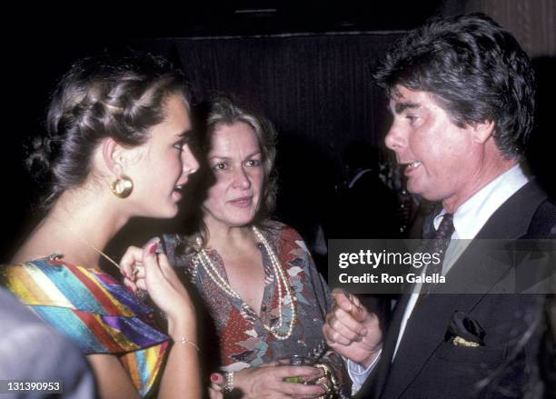 Actress Brooke Shields, mother Teri Shields and columnist James Brady attend the "Endless Love" Premiere Party on July 16, 1981 at Hisae Restaurant...