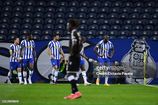 Moussa Marega of FC Porto celebrates with teammates after scores his sides first goal during the Liga NOS match between FC Porto and Vitoria...