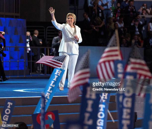 Presidential candidate Hillary Clinton waves to the crowd from the stage at the Democratic National Convention at the Wells Fargo Center in...