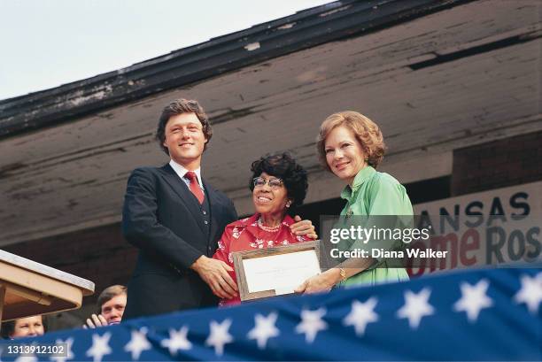 Volunteer is honored by Arkansas Governor Bill Clinton and US First Lady Rosalynn Carter, Pine Bluff, Arkansas, July 23, 1979.