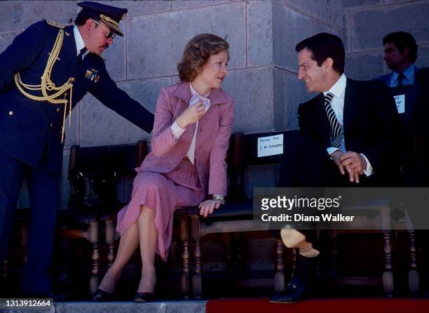 View of US First Lady Rosalynn Carter and Spanish Prime Minister Adolfo Suarez as they talk together before an inauguration and ceremony , Quito,...