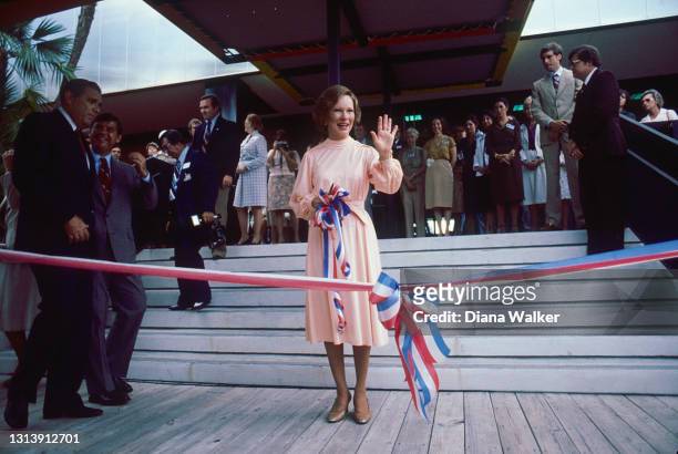 First Lady Rosalynn Carter cuts the ribbon at the dedication ceremony for the opening of the Tampa Museum, Tampa, Florida, September 1979.