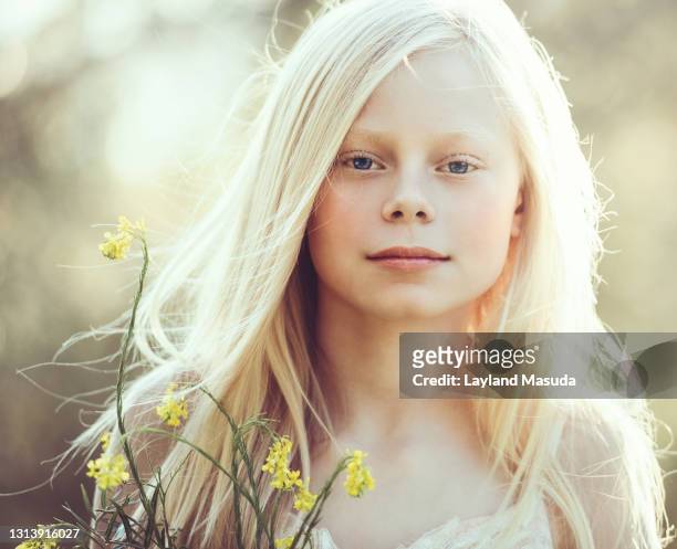 beautiful girl - bright sun - wind - blue eyed soul stock pictures, royalty-free photos & images