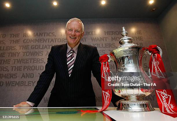 Barry Hearn poses with the FA Cup Trophy on November 4, 2011 in London, England.