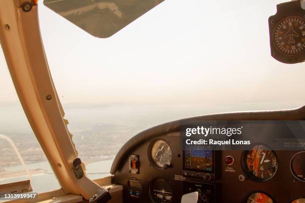 pilot view from the cockpit of a single-engine, propellor airplane - small plane stock pictures, royalty-free photos & images