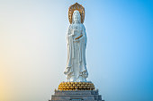 Beautiful front view of 108m high Guanyin of the South Sea statue of Nanshan Buddhism cultural park temple at sunrise in Sanya in Hainan island China
