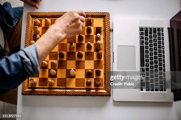 playing chess on - chess championship stock pictures, royalty-free photos & images