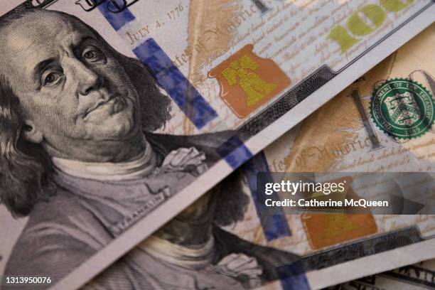 full frame of spread of crisp $100 bills - federal budget stockfoto's en -beelden