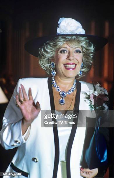 Coronation Street actress Julie Goodyear in character as Bet Lynch during Alma and Mike Baldwin's wedding scene, circa 1992.