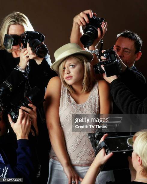 Big Brother 3 star Jade Goody surrounded by paparazzi, circa 2002.