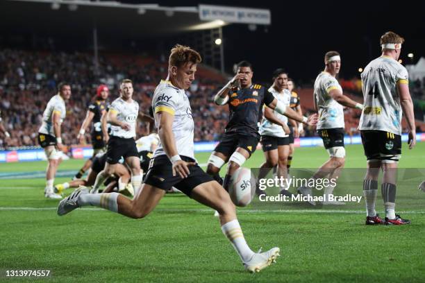 Ruben Love of the Hurricanes clears the ball during the round nine Super Rugby Aotearoa match between the Chiefs and the Hurricanes at FMG Stadium...