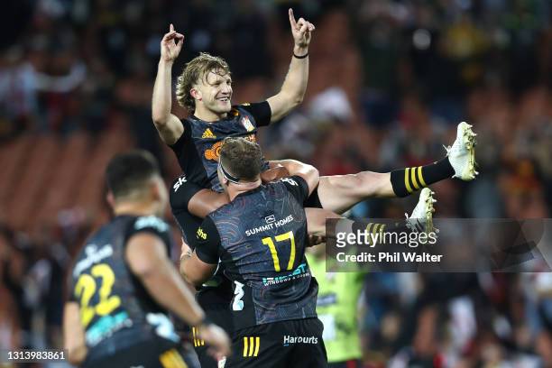 Damian McKenzie of the Chiefs celebrates kicking the match winning penalty during the round nine Super Rugby Aotearoa match between the Chiefs and...