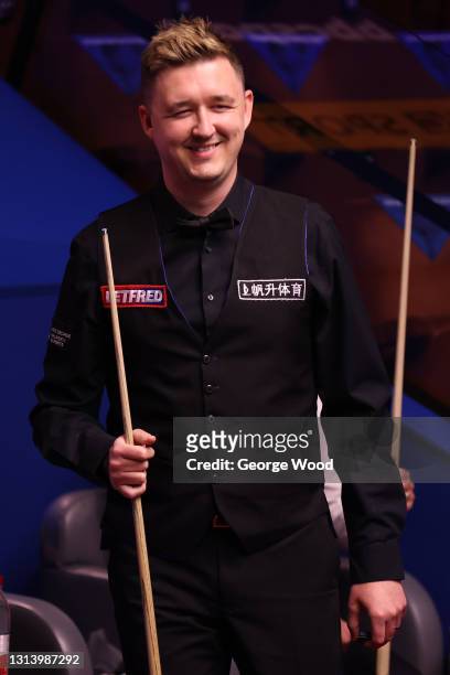 Kyren Wilson of England reacts during the Betfred World Snooker Championship Round Two match between Barry Hawkins of England and Kyren Wilson of...