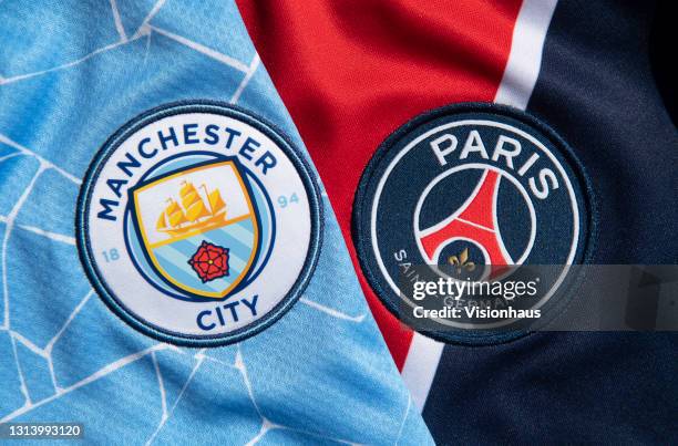 The club badges of Manchester City and Paris Saint-Germain on their first team home shirts ahead of their UEFA Champions League semi final on April...