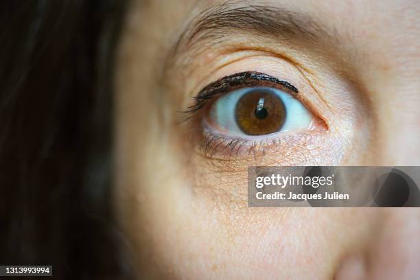 middle age woman eye - femme fatigue stock pictures, royalty-free photos & images