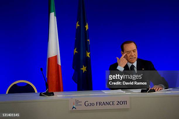 Italian Prime Minister Silvio Berlusconi attends a press conference during the second day of the G20 Summit on November 4, 2011 in Cannes, France....