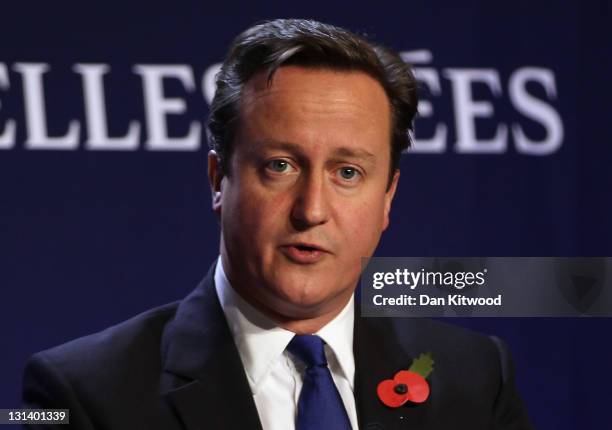 British Prime Minister David Cameron addresses members of the media during a conference on the second and final day of the G20 Summit on November 4,...