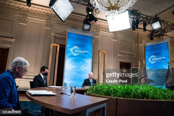 President Joe Biden delivers remarks as National Climate Adviser Gina McCarthy, Transportation Secretary Pete Buttigieg, and U.S. Trade...