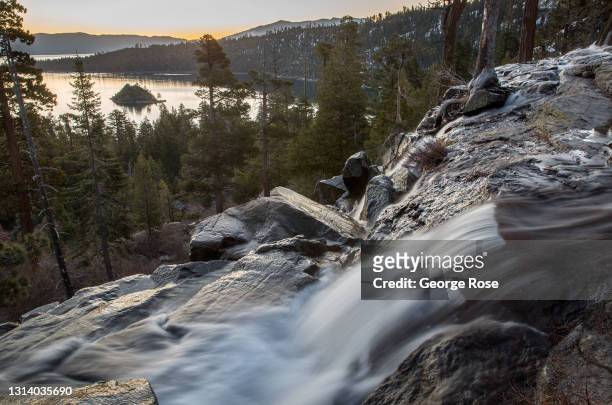 The sun rises over Lake Tahoe, Emerald Bay, and Eagle Falls as viewed in this early morning photo taken on April 12 in South Lake Tahoe, California....