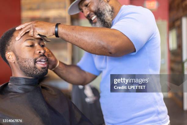 barber shop - barber shop interior stock pictures, royalty-free photos & images