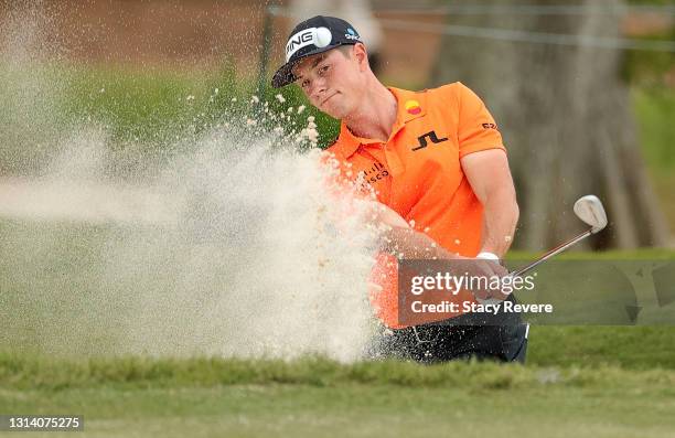 Viktor Hovland of Norway plays a shot from a bunker on the 11th hole during the second round of the Zurich Classic of New Orleans at TPC Louisiana on...