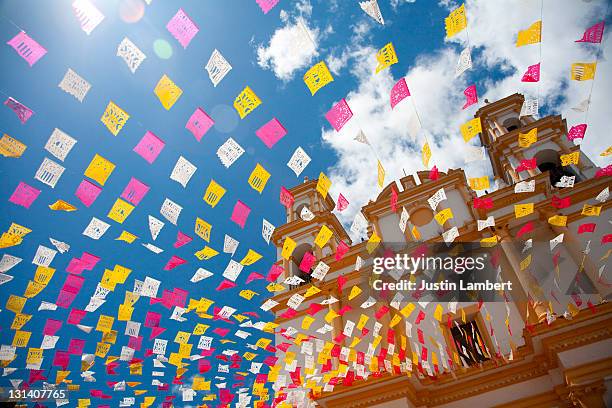 bunting outside church in san cristobal mexico - mexican bunting stock pictures, royalty-free photos & images