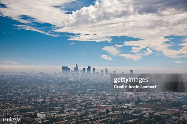 los angeles skyline with smog - los angeles city aerial stock pictures, royalty-free photos & images