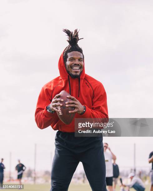 Quarterback Cam Newton smiling through drills during Patriot's Pats West Off Season Workout in a park on March 23, 2021 in Orange County, CA.